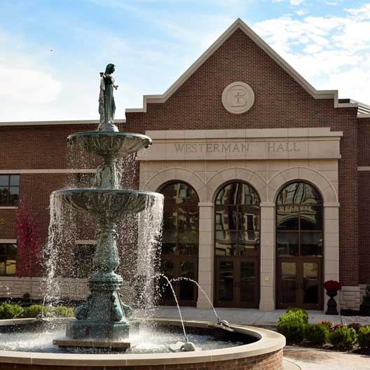 Our Lady of Grace Fountain with the Westerman Hall facade behind