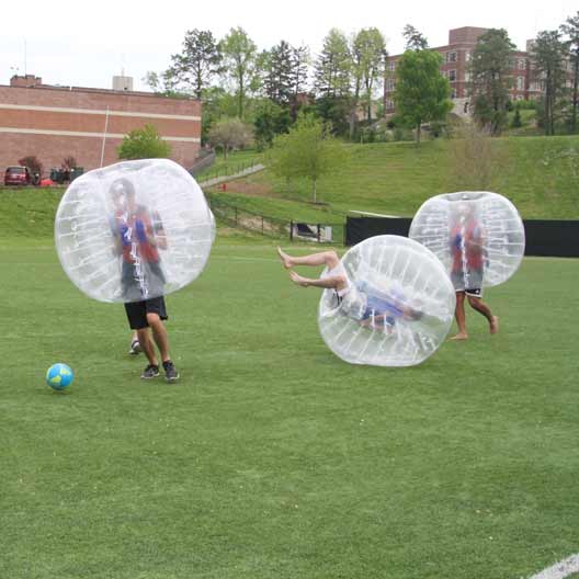 Students playing bubble soccer