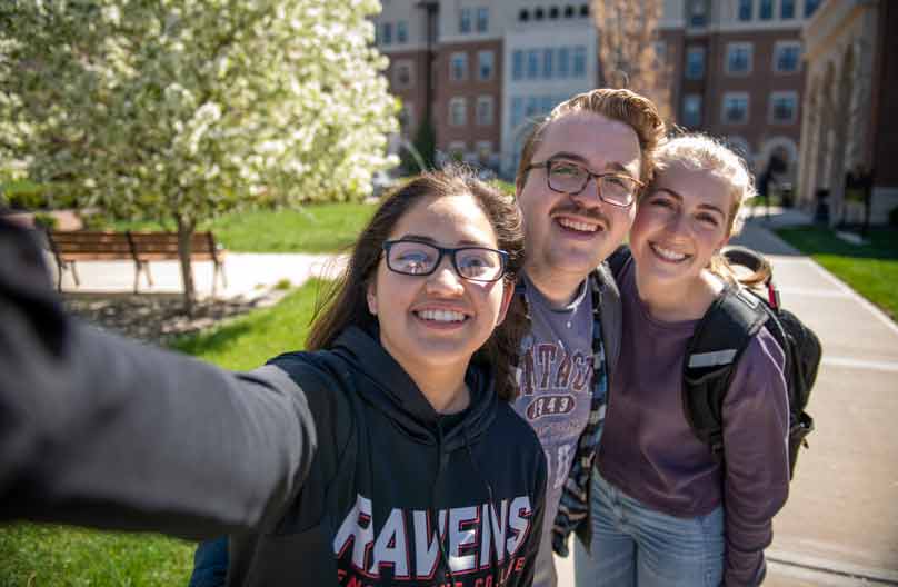 Students pose for a selfie-style photo