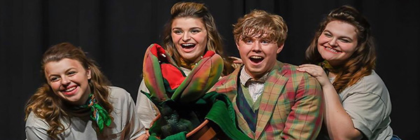 Student actors in costume from 2022 theatre production of Little Shop of Horrors