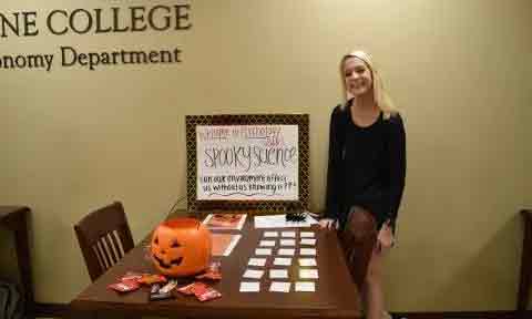 A Benedictine student with one of the Spooky Science games.
