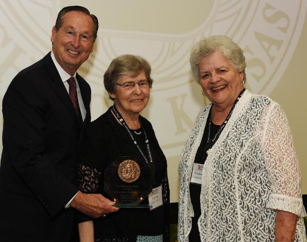 President Stephen Minnis, honoree S. Jo Ann Fellin, and Prioress S. Esther Fangman at the Alumni Banquet.