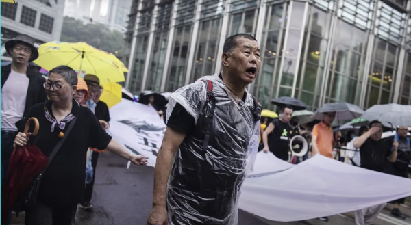 Jimmy Lai leads a protest march in Hong Kong prior to his arrest.