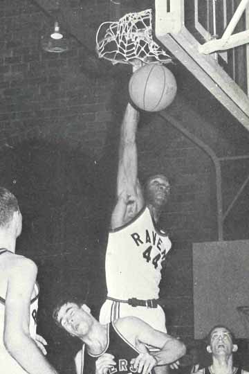 Darryl Jones makes a basket during a basketball game
