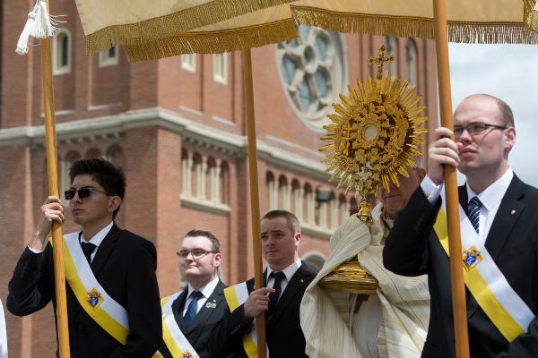 Benedictine College Knights of Columbus participate in a Eucharistic Procession in Atchison, Kansas