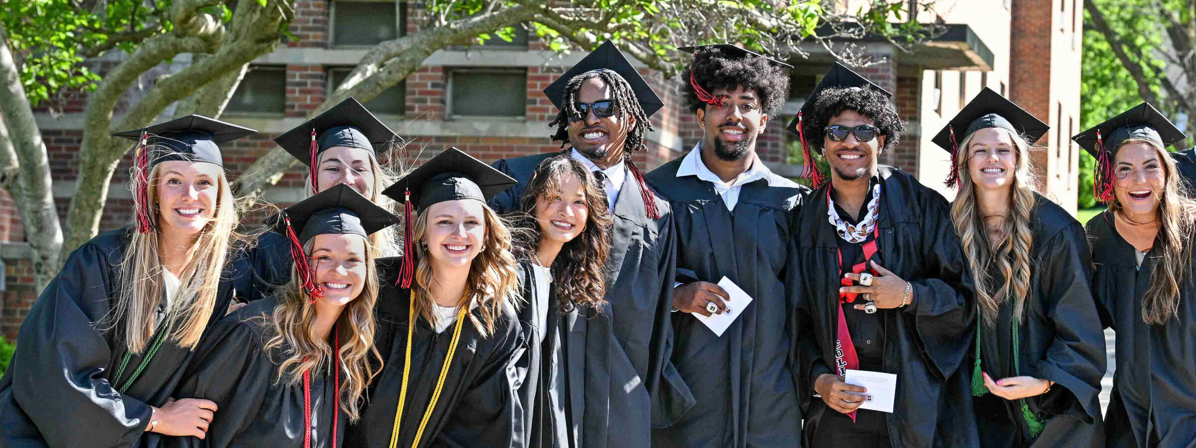 Graduates celebrating during Commencement weekend